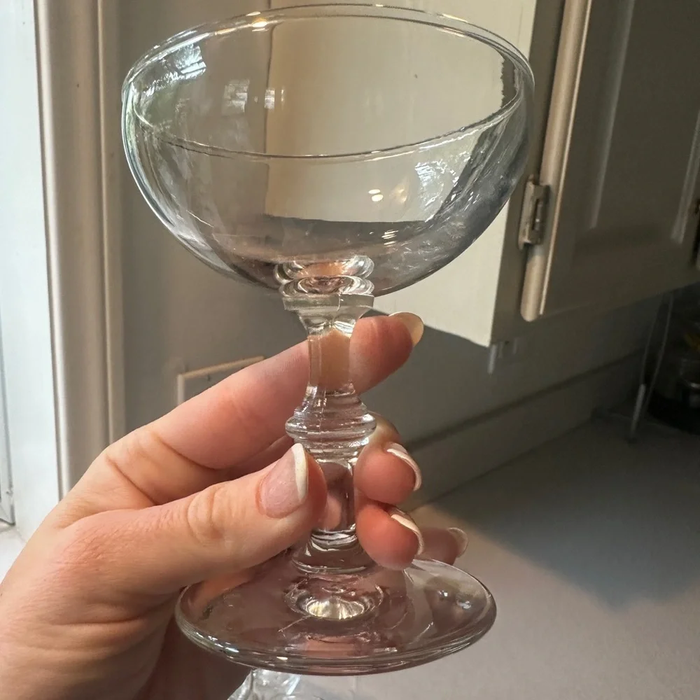 Set of 9 vintage champagne glasses.
